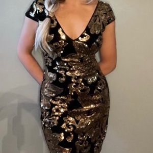 Black velvet and gold sequin dress